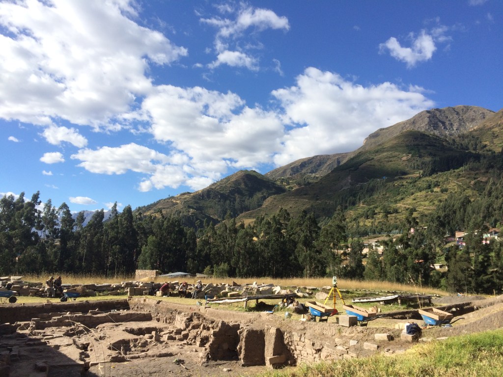 Active dig area at Chavín backed by mountains